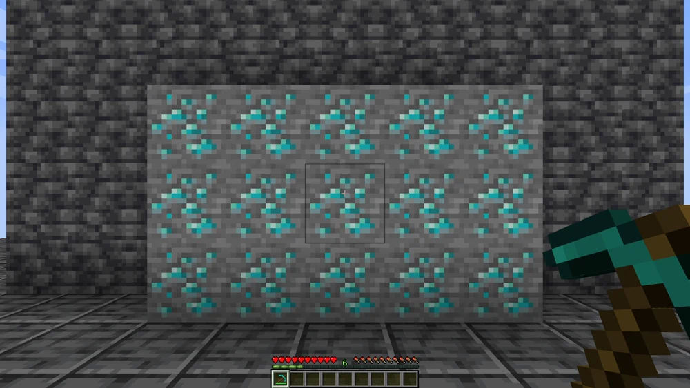 A diamond vein of fifteen blocks before mining, the diamond pickaxe in hand